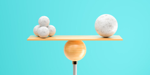 wooden scale balancing one big ball and four small ones on light blue background
