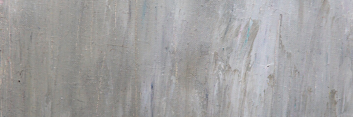 abstract colored background from stained colored oil paint on linen canvas