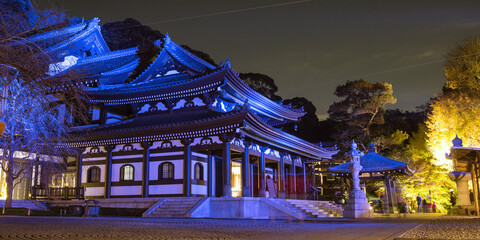 Main hall of Hasedera Temple lit up in blue during autumn, Kamakura, Japan　青く照らされた鎌倉の長谷寺 秋の紅葉ライトアップ 観音堂 夜景