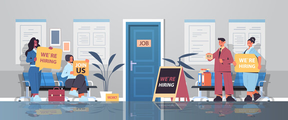 mix race hr managers holding we are hiring join us posters vacancy open recruitment human resources concept office corridor interior horizontal full length vector illustration