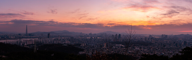 Panoramic view of Seoul from Achasan Mountain during the early evening. 