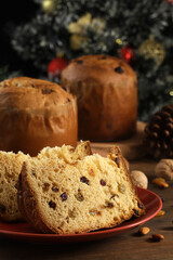 Fototapeta na wymiar Delicious slice of Panettone with candied fruit