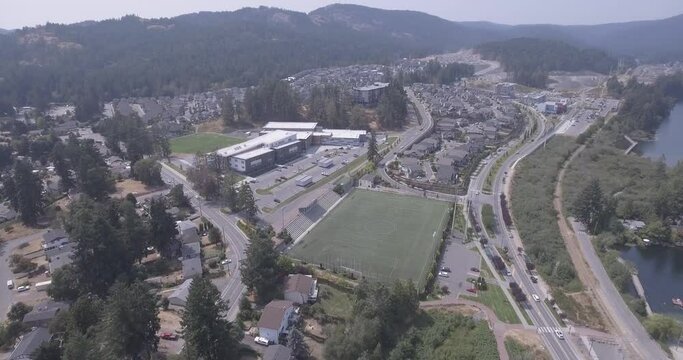 4K Drone Passing Over Small Town in Langford British Columbia