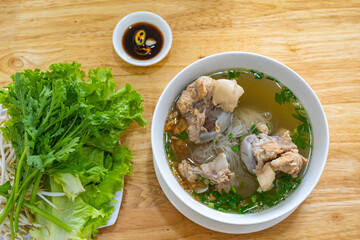 Delicious noodles soup with meat, pork and vegetable
