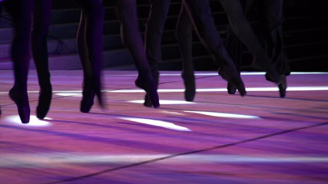 Ballet Step. Dancers make moves synchronously standing on tiptoes