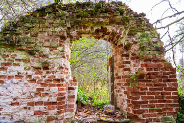 Ruins of an ancient brick house in a forest near Moscow