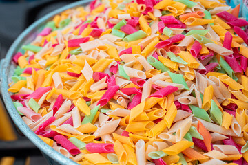 colorful pasta close up in dish uncooked.