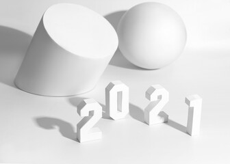 White paper figures numbers 2021  with geometric shapes on white background