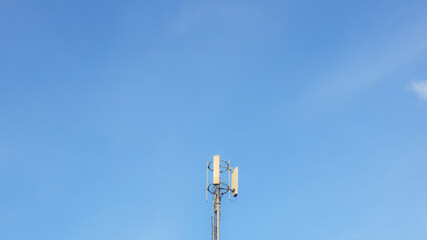 Fototapeta na wymiar satellite dish against blue sky