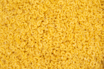  frontal shot of macaroni pasta in large quantity