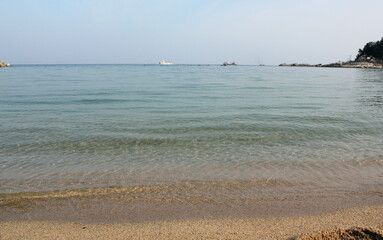 Wave of blue sea on beach in south korea at east sea