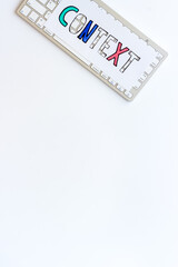 Fototapeta na wymiar Context online advertising concept. Word Context on the keyboard, top view