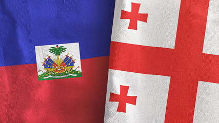 Georgia and Haiti two flags textile cloth 3D rendering