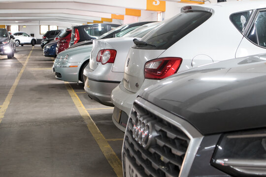 Cars parked inside a multistory car park building
