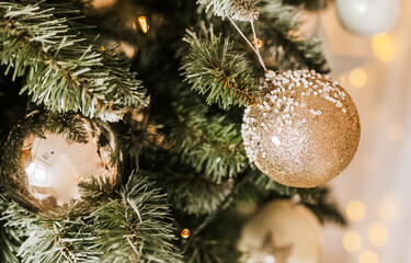 Christmas decorations at home. New year lights, toy, wreath and tree