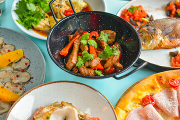 Different appetizer and anti pasti, table covered with delicious seasonal autumn food. Seasonal menu concept.