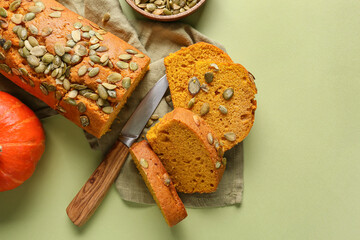 Tasty pumpkin pie on color background