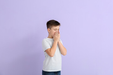 Coughing little boy on color background