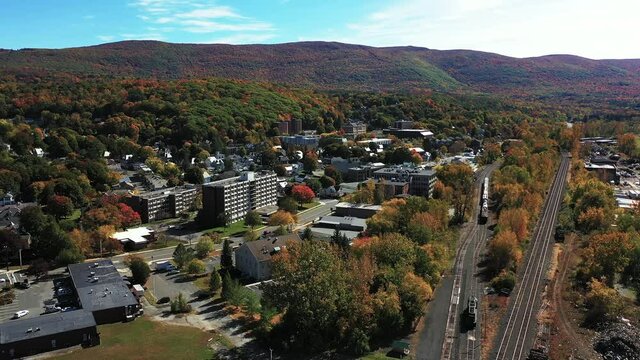 Drone Aerial View of North Adams, Massachusetts, USA. Scenic City, Vivid Forest on Bright Sunny Autumn Day