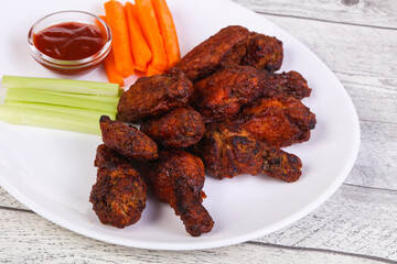 Chicken wings bbq with celery and carrot