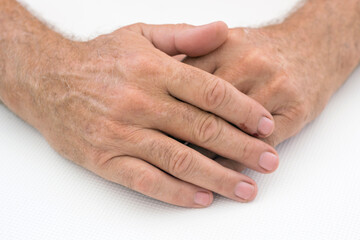 Fototapeta premium Old man hands on white background