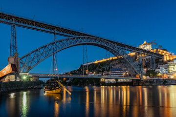 Fototapeta na wymiar Luis I Bridge during evening twilight in Porto, Portugal.