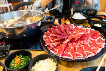 many Sliced beef served as a set For hotpot or sukiyaki