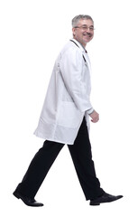 friendly doctor striding towards you. isolated on a white