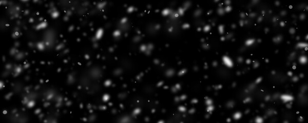 Obraz premium snowfall on isolated black background