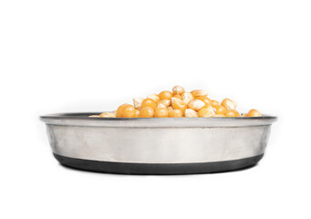 Pet food dish filled with corn kernels, perspective view. Concept for too much corn gluten meal in pet food, cats don't eat corn in nature or cats are carnivores. Isolated on white.