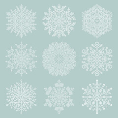 Set of vector snowflakes. White round winter ornaments. Snowflakes collection. Snowflakes for backgrounds and designs
