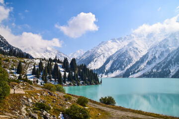 Stunning Big Almaty Lake in Kazakhstan. The Big Almaty Lake is natural alpine reservoir. It is located in the Trans-Ili Alatau mountains