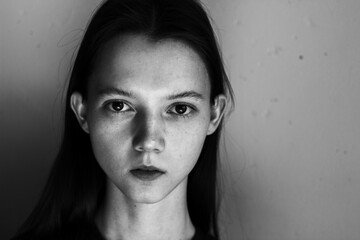 Close-up emotional portrait of young woman