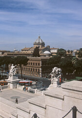 View of Rome downtown skyline with  palazzo venezia seen from Piazza Venezia in Rome, Italy.