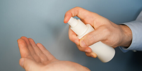 Close up of person pressing on sanitizer. Covid 19, medical concept