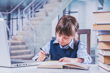 Young beautiful business child girl working with documents in office. Humorous image.