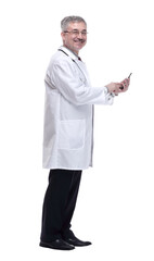 smiling doctor with smartphone looking forward. isolated on a white