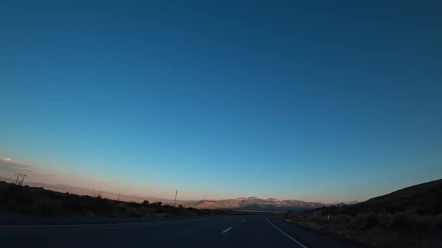Highway in the United States during sunset. Picturesque nature.
