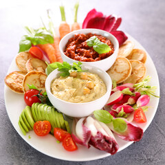vegetable snacks plate, vegetables and dips- health food