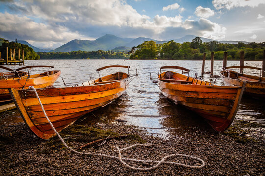 Rowing boats on the shore of Derwent water in Keswick,  Lake district,  Cumbria,  United Kingdom