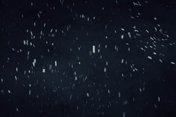 Snowstorm on dark blue background