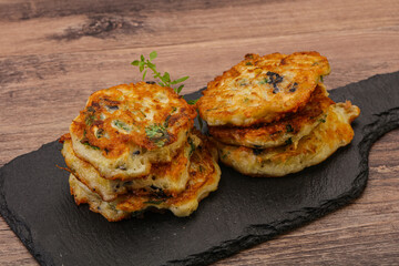 Zucchini pancakes with herbs and spices