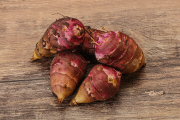 Raw topinambur root or Jerusalem artichoke