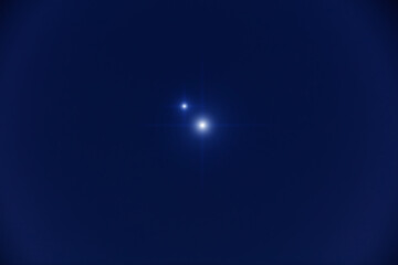 Planet conjunction and Milky Way stars photographed with long exposure.
