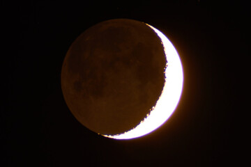 Young Moon photographed through a long focal telescope.