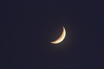 Obraz na płótnie Canvas Young Moon photographed through a long focal telescope.