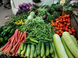 Fresh green vegetables background wallpaper for grocery shops.