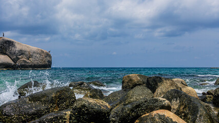 Huge jumping rock clif in ocean