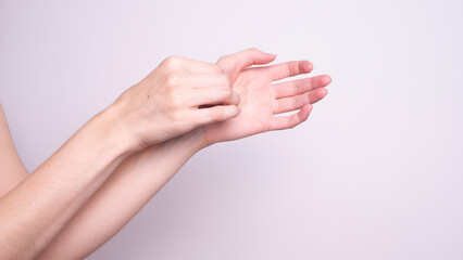 Parkinson's disease symptoms. Close up of tremor (shaking) hands of Middle-aged women patient with Parkinson's disease. Mental health and neurological disorders.