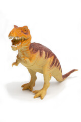 Fototapeta premium Tyrannosaurus plastic model toy in white background